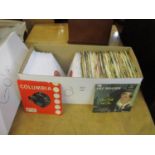Box of assorted singles records from the 1960's