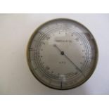A GPO compensated brass barometer with a silvered dial inscribed No 1A AJC, 65/1 2 1/2" dia