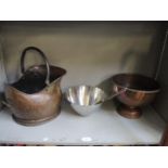 A copper coal scuttle, a Sheffield plated footed bowl with twin brass lion mask ring handles, and