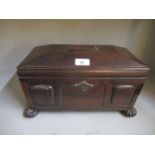 A Regency coromandel sarcophagus shaped tea caddy, domed top with moulded edge, twin ring turned