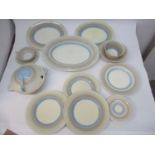 A Susie Cooper part dinner service decorated with brown, grey and blue bands, scratches to