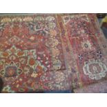 Two rugs to include a hand woven red ground rug having a central motif and geometric designs 320cm x