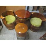 Three pieces of Coopers Craft by Lethbridge bar furniture made from oak barrels consisting of an