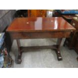 A Victorian mahogany side table with a concealed drawer with tapered supports, on founded feet 76