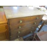 A 19th century oak chest of four long graduated drawers 99.5cm h x 105cm w