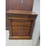 An Edwardian string inlaid mahogany table top collector's cabinet, with moulded cornice above a