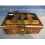 An early 20th century Italian olive wood and Sorrento marquetry jewellery box in the form of a row