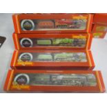 Four boxed 00 gauge Hornby locomotives to include a R.380 Stowe, R.033 Morning Star, R.398 Flying