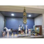 A group of ceramic and horse related ornaments to include two Royal Crown Derby animal paperweights,