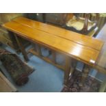 A Granville oak side/dining table with a twin foldover top, on square legs, 79 h x 151cm w