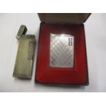 A Dunhill lighter together with a Colibri boxed lighter