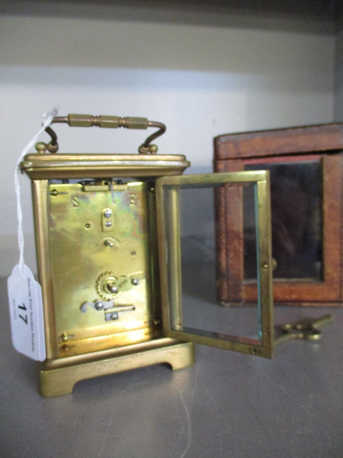 A French brass cased carriage clock, five windows, presentation inscription to top, in leather box - Image 4 of 4