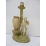 A Royal Worcester blush ivory glaze candlestick fashioned as a tree by a large basket and a man
