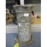 A Victorian lead garden planter, cylinder form with crimped top and flanged base, decorated with a