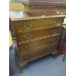 An early 20th century mahogany four drawer chest having cabriole legs with ball and claw feet 93cm h