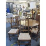 A reproduction mahogany sofa table, a reproduction nest of tables A/F, six Ercol chairs and an Ercol