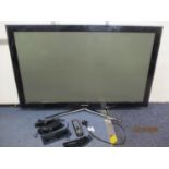 A Samsung 3D flat screen television 50" on stand with four pairs of 3D glasses and remote