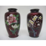 A pair of mid 20th century Japanese cloisonné vases, one decorated with prunus blossoms and two