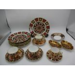 A quantity of Royal Crown Derby plates, dishes and cups to include Imari patterns 1128 and 2451