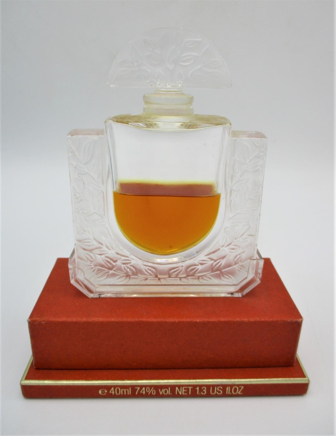 A Lalique Limited Edition perfume, etched to underside Lalique R France, 40 ml, opened bottle, in