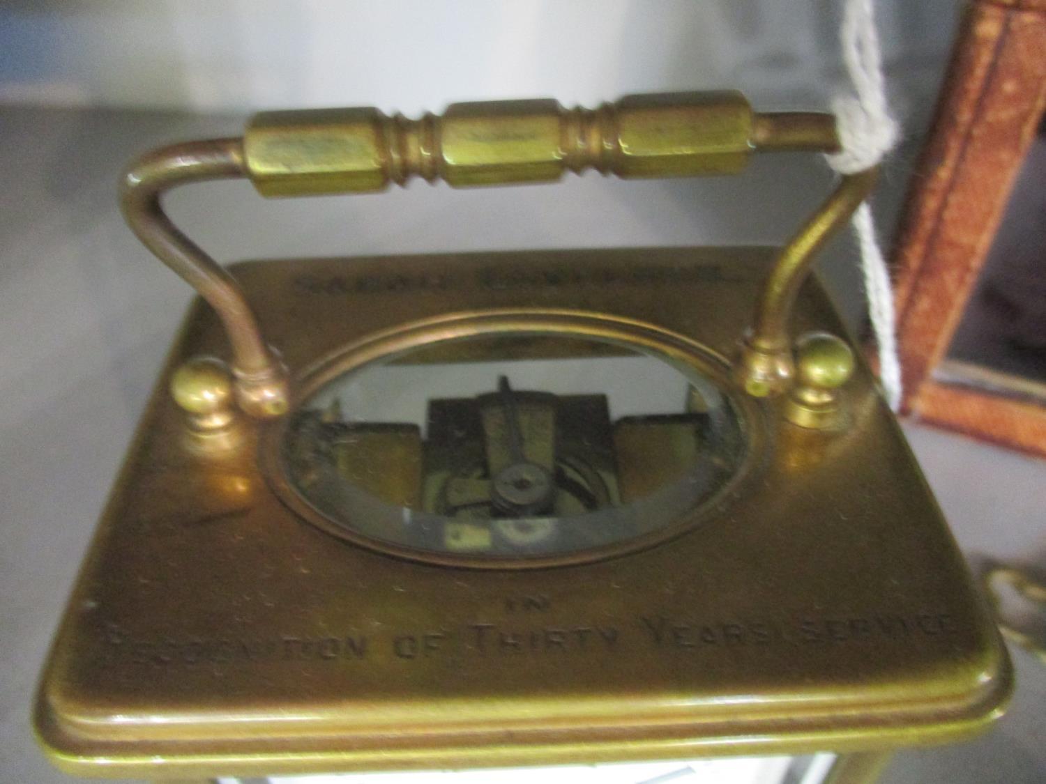 A French brass cased carriage clock, five windows, presentation inscription to top, in leather box - Image 3 of 4