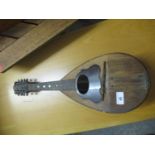 A signed Gav. Giovanni de Meglio E. Figlio, Italian wooden mandolin, label to interior, signed in