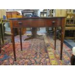 An early Victorian string inlaid mahogany bow front side table with two drawers, on ring turned