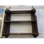 A mahogany three tier open wall shelf together with a carved twin handled tray and a mahogany and