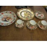 A quantity of mixed Royal Crown Derby plates and cups together with a 19th century dish