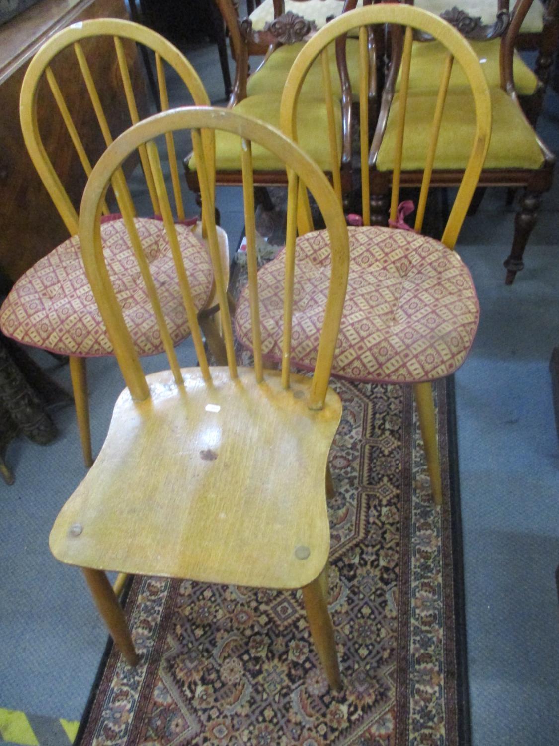 Three Ercol spindle back beech chairs of two different designs, one A/F (complete, just requires