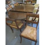 A mid 20th century mahogany twin pedestal dining table and a set of six early 19th century