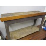 A two tier wooden work bench
