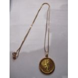 An 18ct gold St Christopher pendant, weight 5.41g together with a 9ct gold chain, 2.65g