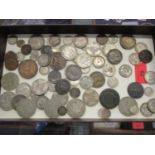 A selection of mainly British and commonwealth silver and copper coinage to include a 1562 Elizabeth