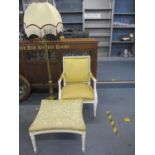 A French style white painted open armchair with gold coloured upholstery together with a matched