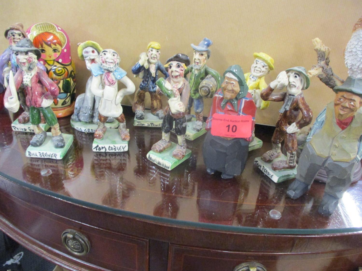 A set of nine Will Young Widecombe Fair novelty pottery figures to include Bill Brewer and other