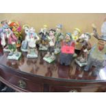 A set of nine Will Young Widecombe Fair novelty pottery figures to include Bill Brewer and other