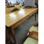 A French cherrywood kitchen table (purchased from Heals for £2000) having a slide and drawer circa