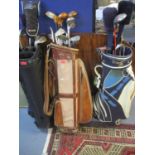 Three golf bags to include Wilson and contents to include various golf clubs comprising Tourney,