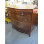 A Victorian flame mahogany cut clown bow-fronted chest of two small and three long drawers, in the