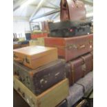 A vintage leatherette and bentwood bound trunk with internal Harrods label together with five