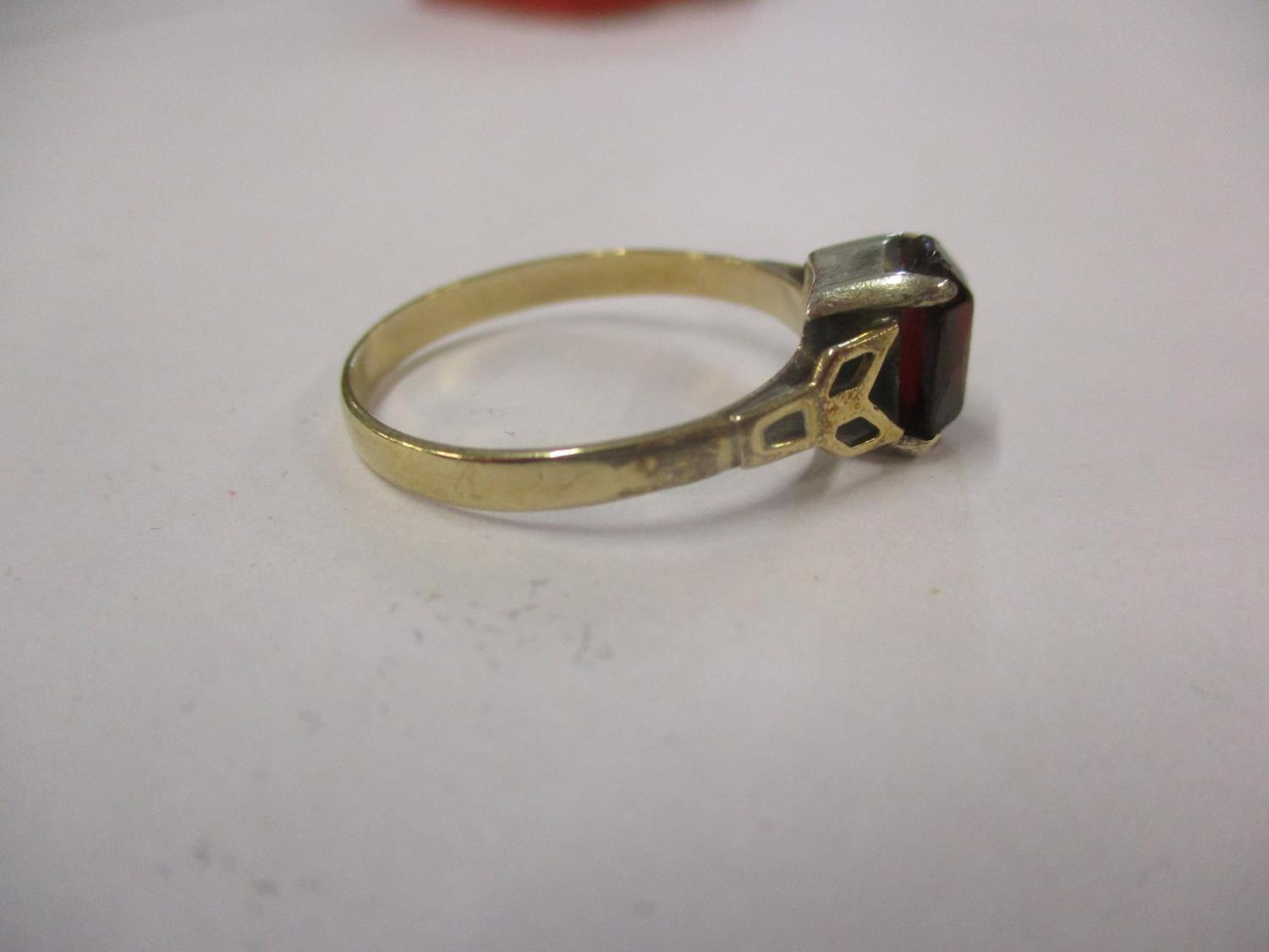 A 9ct gold and silver set garnet dress ring, weight 2.4g in total, ring size UK letter R - Image 2 of 4