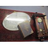 A mahogany cased wall clock, a Rev. John Eadie family bible and a metal framed and oval wall mirror