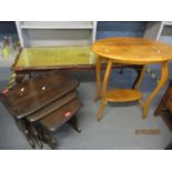 A Long John coffee table with leather inset scriber having cabriole legs and a carved frieze