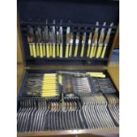 An oak cased canteen off Mappin & Webb silver plated and stainless steel cutlery and flatware,