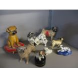 A group of china models to include Beswick pugs together with a modern trinket box with a seated dog