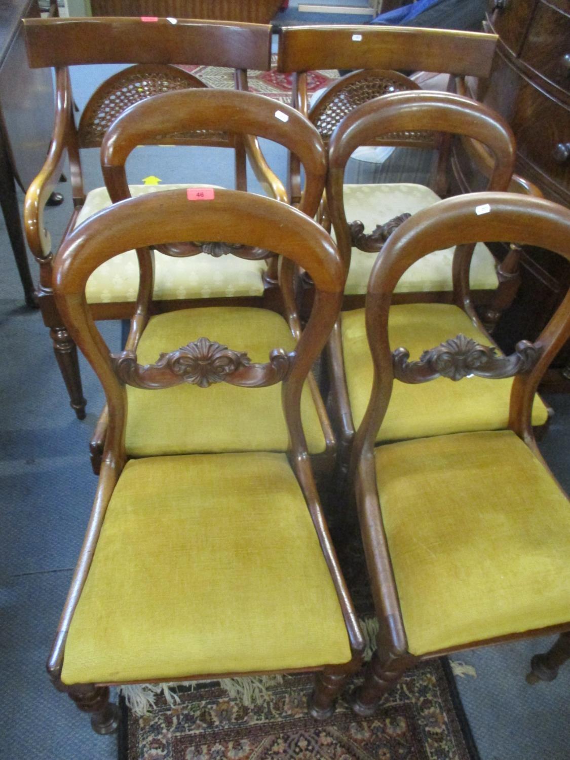 Four mahogany kidney backed dining chairs with drop in seats together with a pair of reproduction