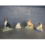 Basil Matthews china models of dogs comprising Suza, a Pug, a Spaniel and a Pekingese