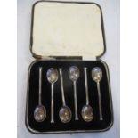 A cased set of 6 early 20th century teaspoons, weight 44.4g together with a cased set of twelve