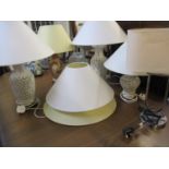 A group of modern table lamps to include Oriental style pierced examples